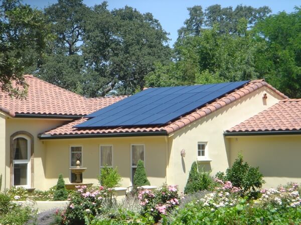 House with Solar Panels on Roof