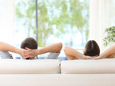 Couple Enjoying Looking Out New Windows
